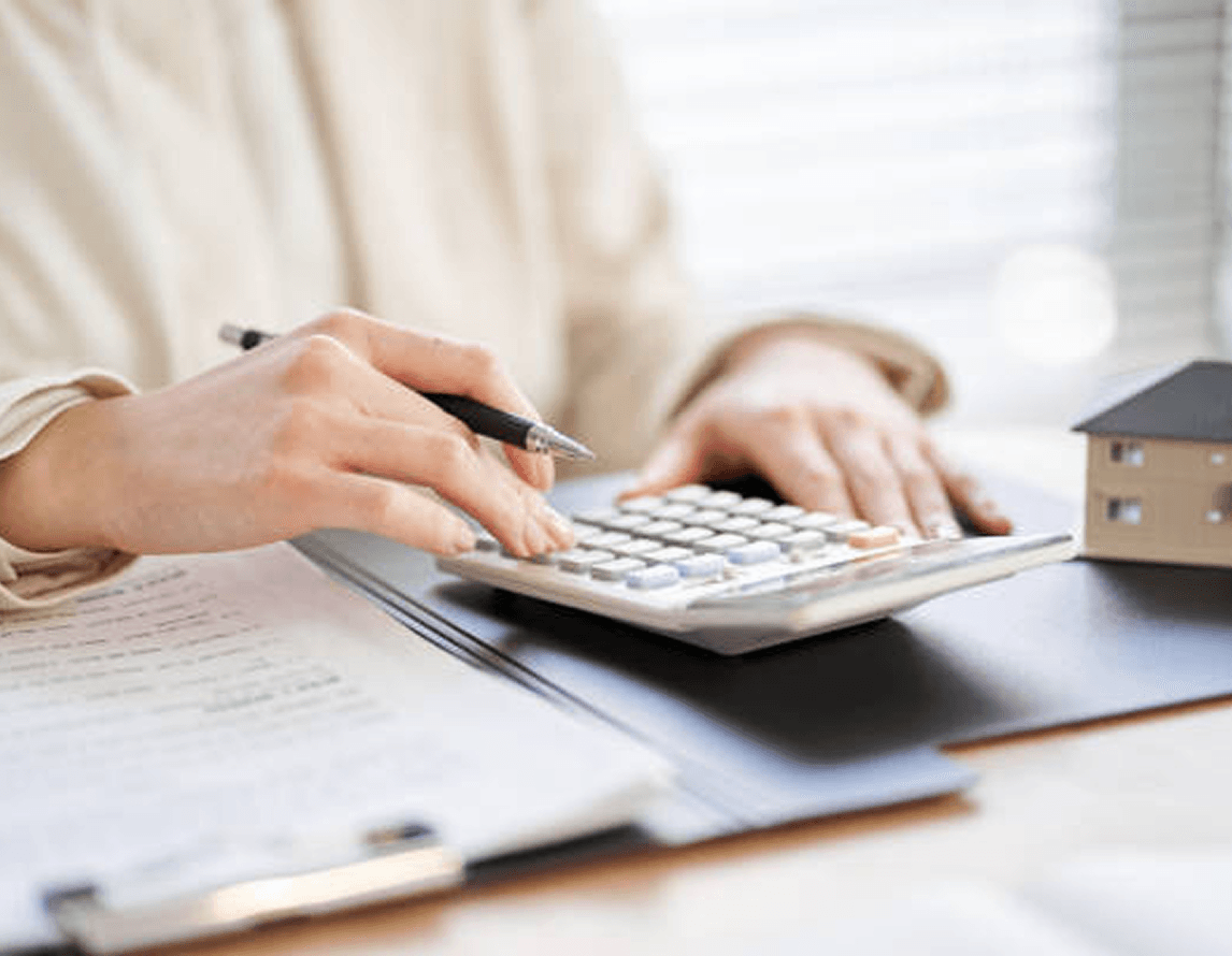 Man using a calculator